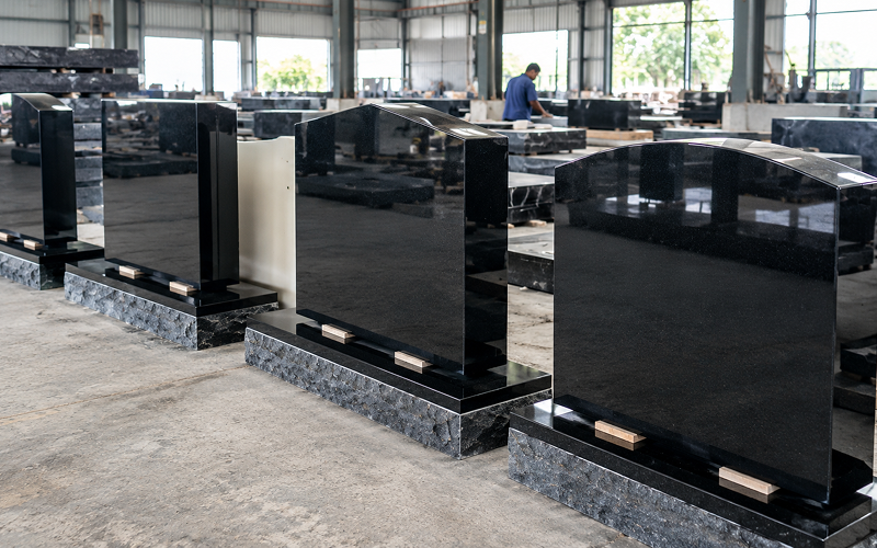 Black granite headstones showing durable polished finish